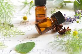 Two brown bottles of essential oils