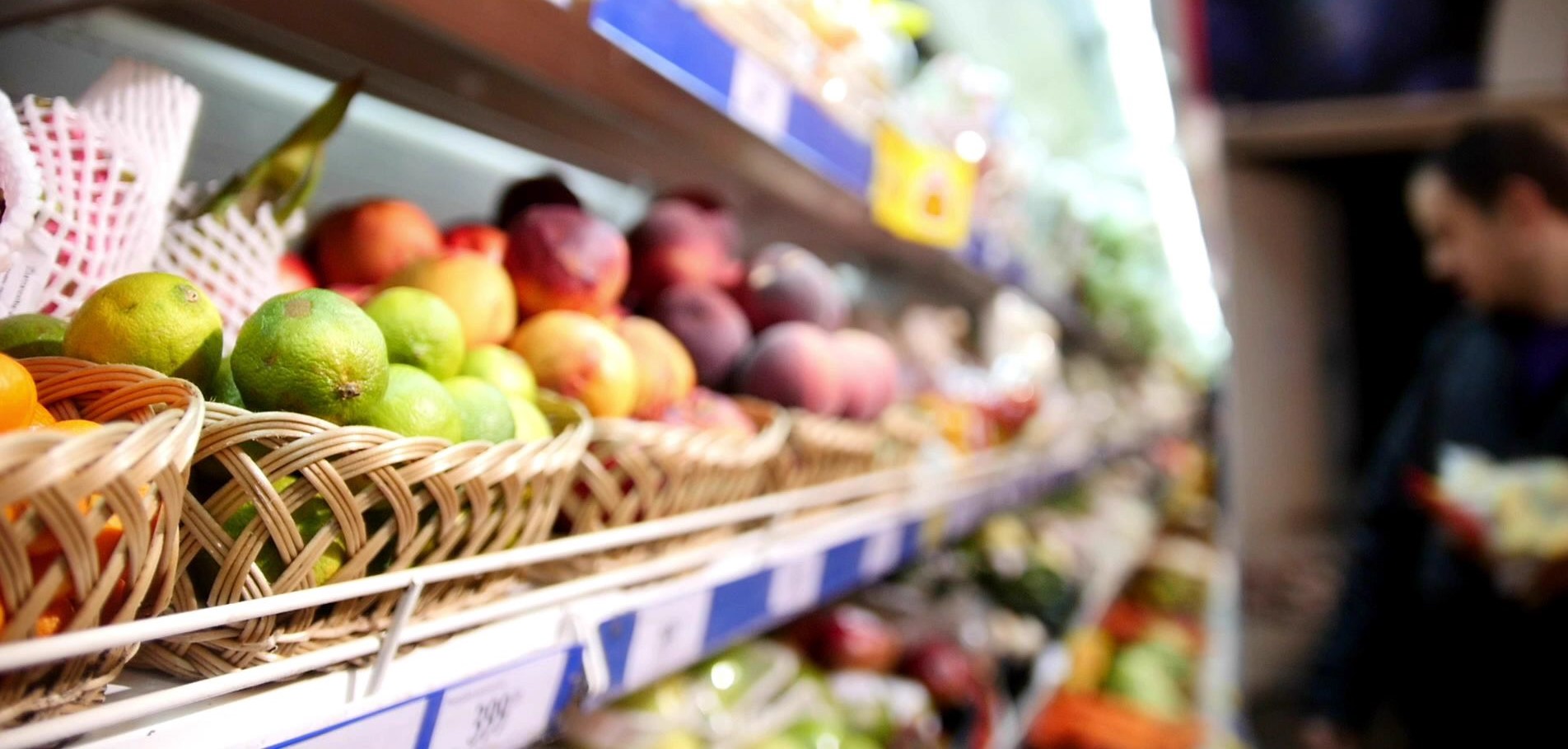 Aisle of fruit at the grocery store