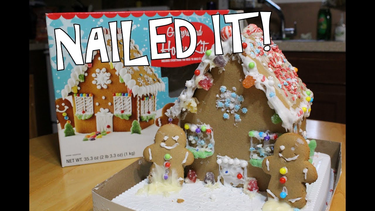 a sloppy looking homemade ginger bread house with caption nailed it!